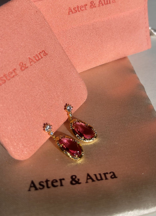 Ruby Red Ocean Crystal Gold Drop Earrings by Aster & Aura, a red crystal and gold drop earring for cocktail weddings.