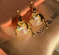 Kaia Gold Drip Pearl Iridescent Huggies Earrings – view 4